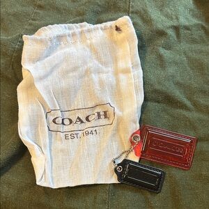 Two Coach Hangtags with a Coach Dust Cover